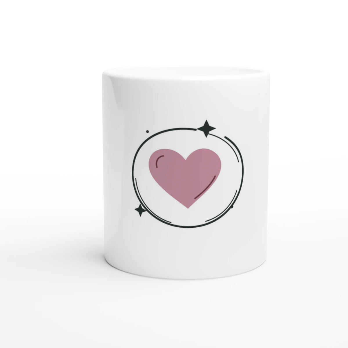 White ceramic mug with a dusty-pink heart inside an open dark-green circle, accented with two small stars.